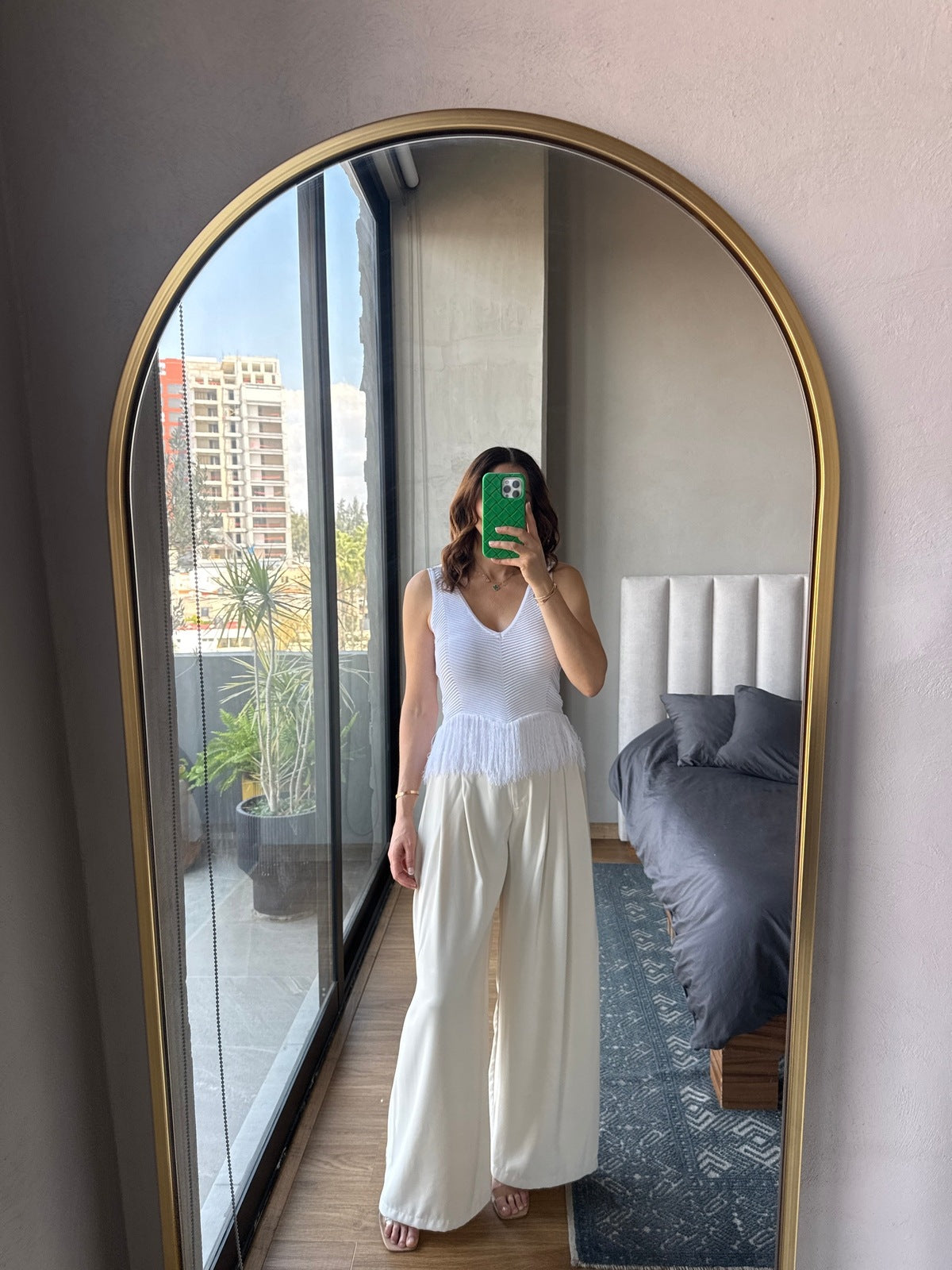 Blusa sin mangas tejida con flecos blanca