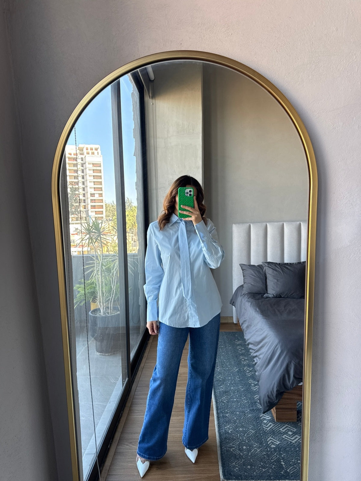 Blusa con corbata azul