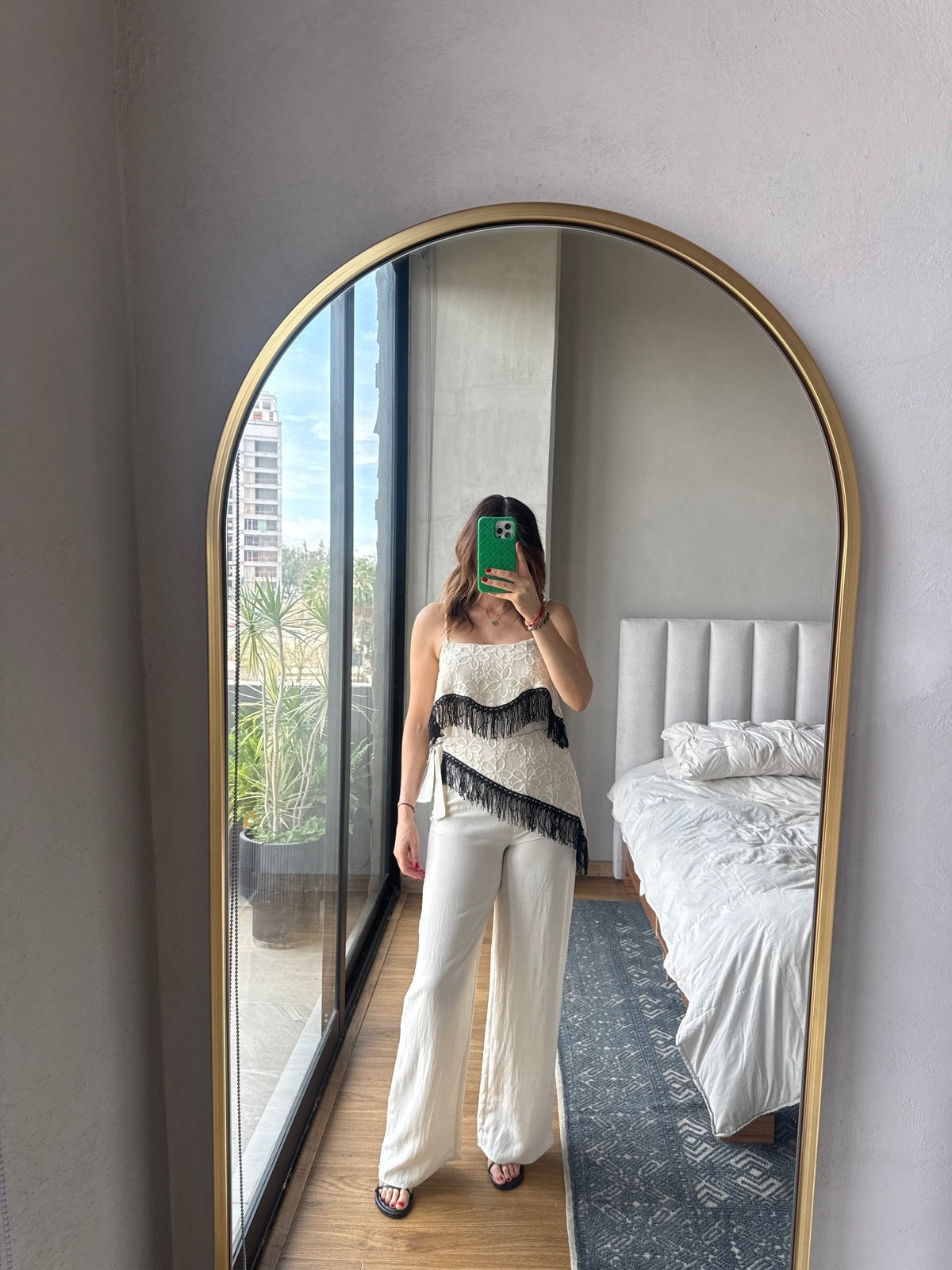 Set blusa y pantalón con detalle fringe en negro