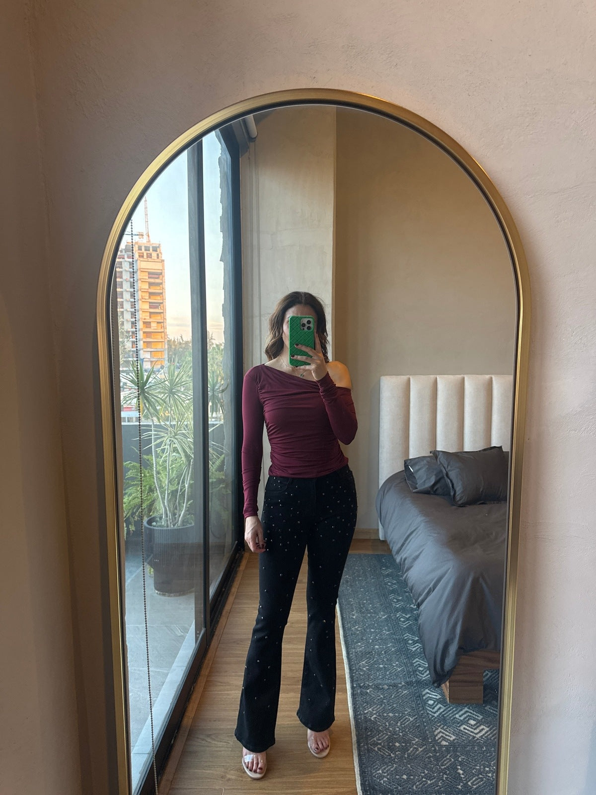 Blusa asimétrica manga larga tinta