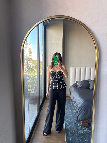 Set blusa strapless con aplicaciones y pantalón negro