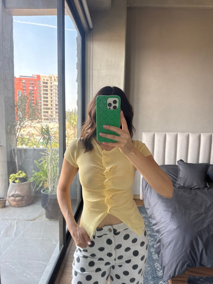 Blusa botones amarilla