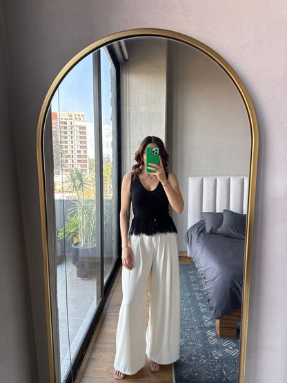 Blusa sin mangas tejida con flecos negra