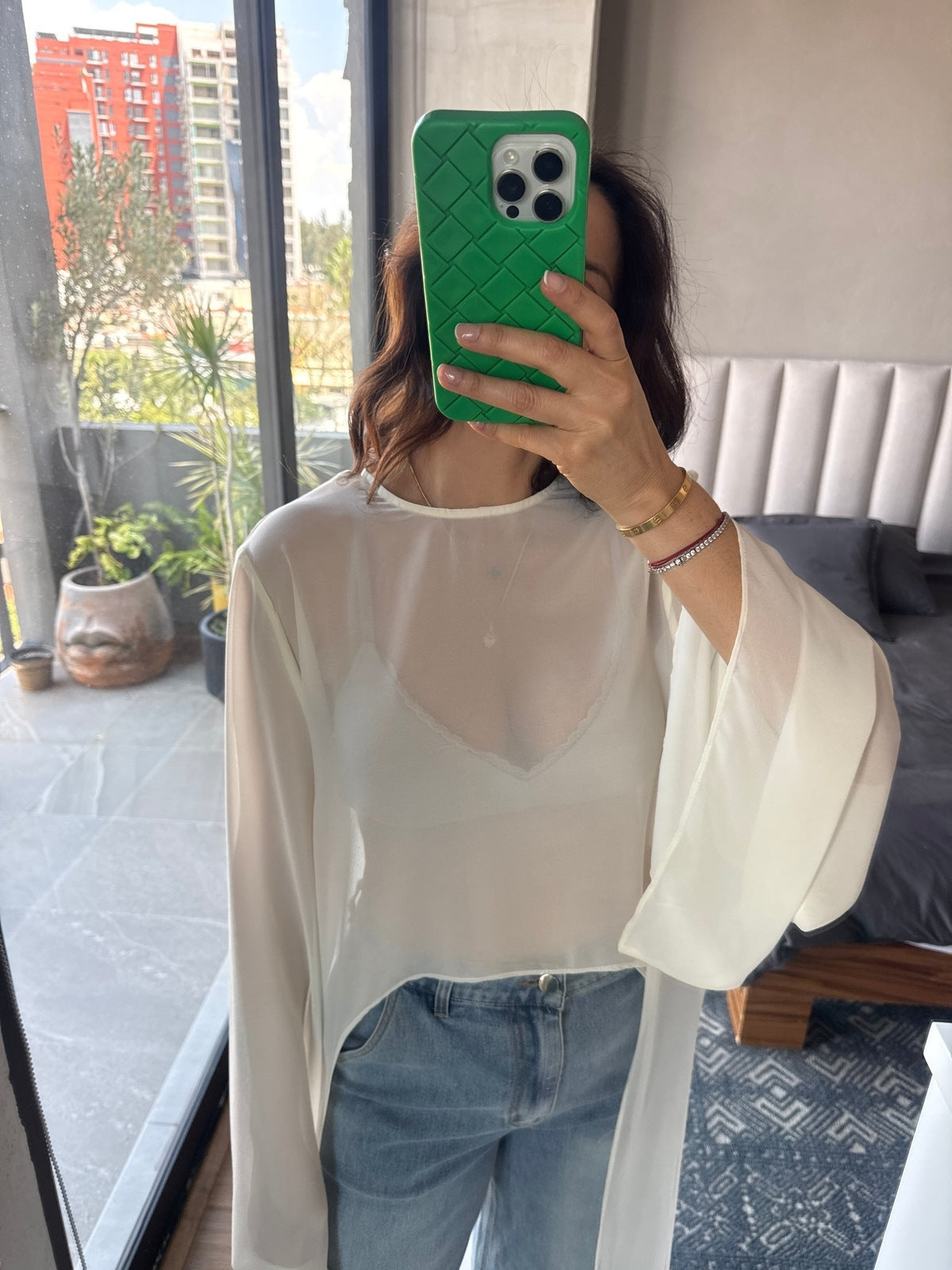 Blusa manga larga crema high low