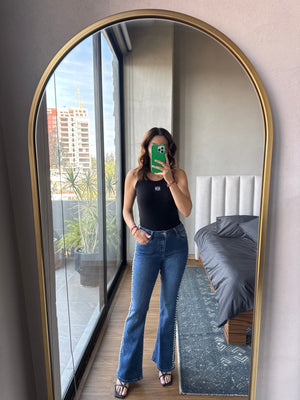 Jeans con studs laterales