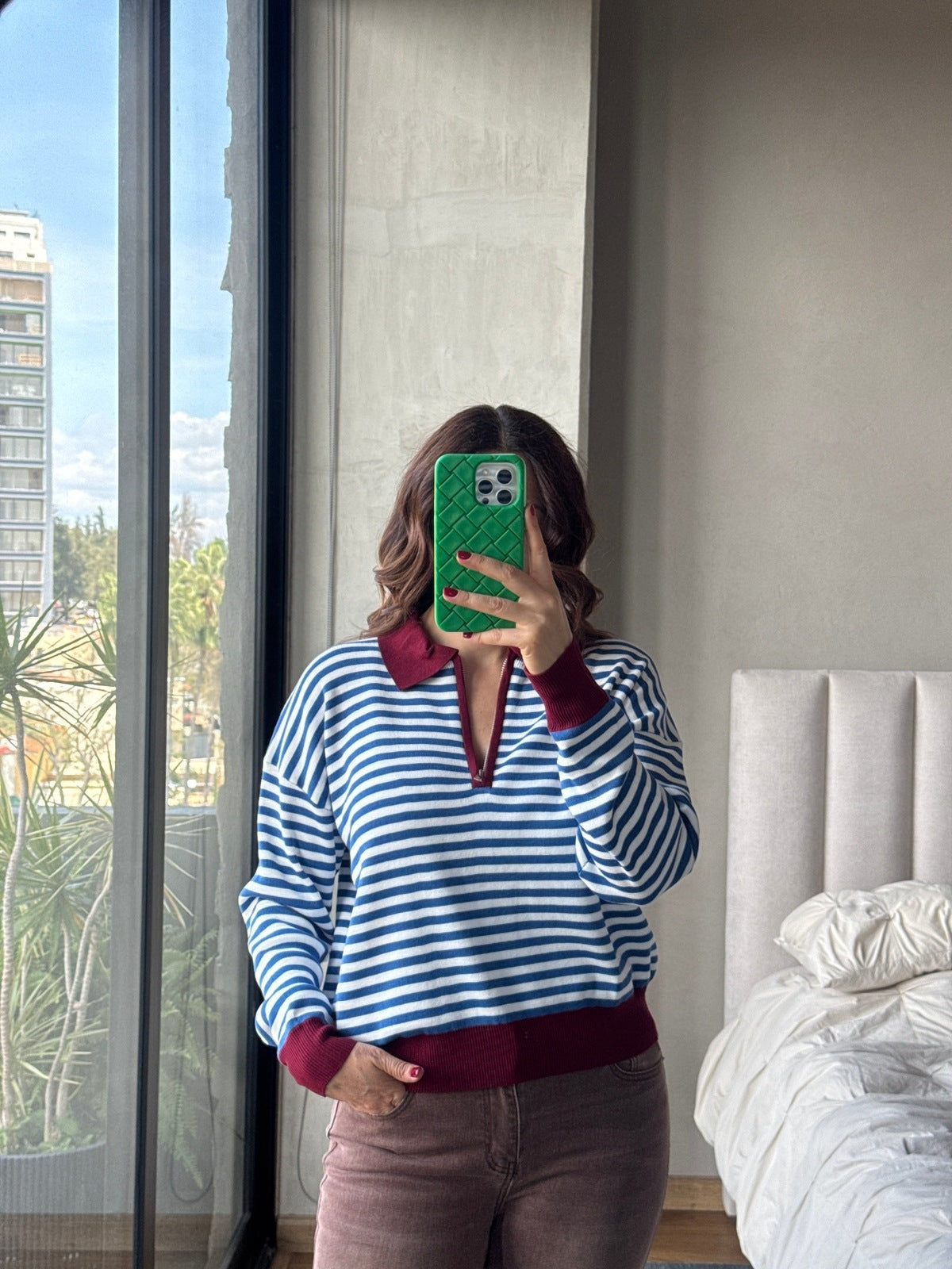 Blusa polo cierre rayas con cuello azul
