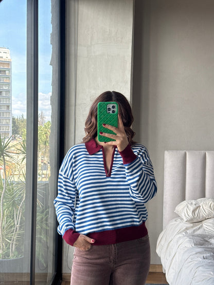 Blusa polo cierre rayas con cuello azul