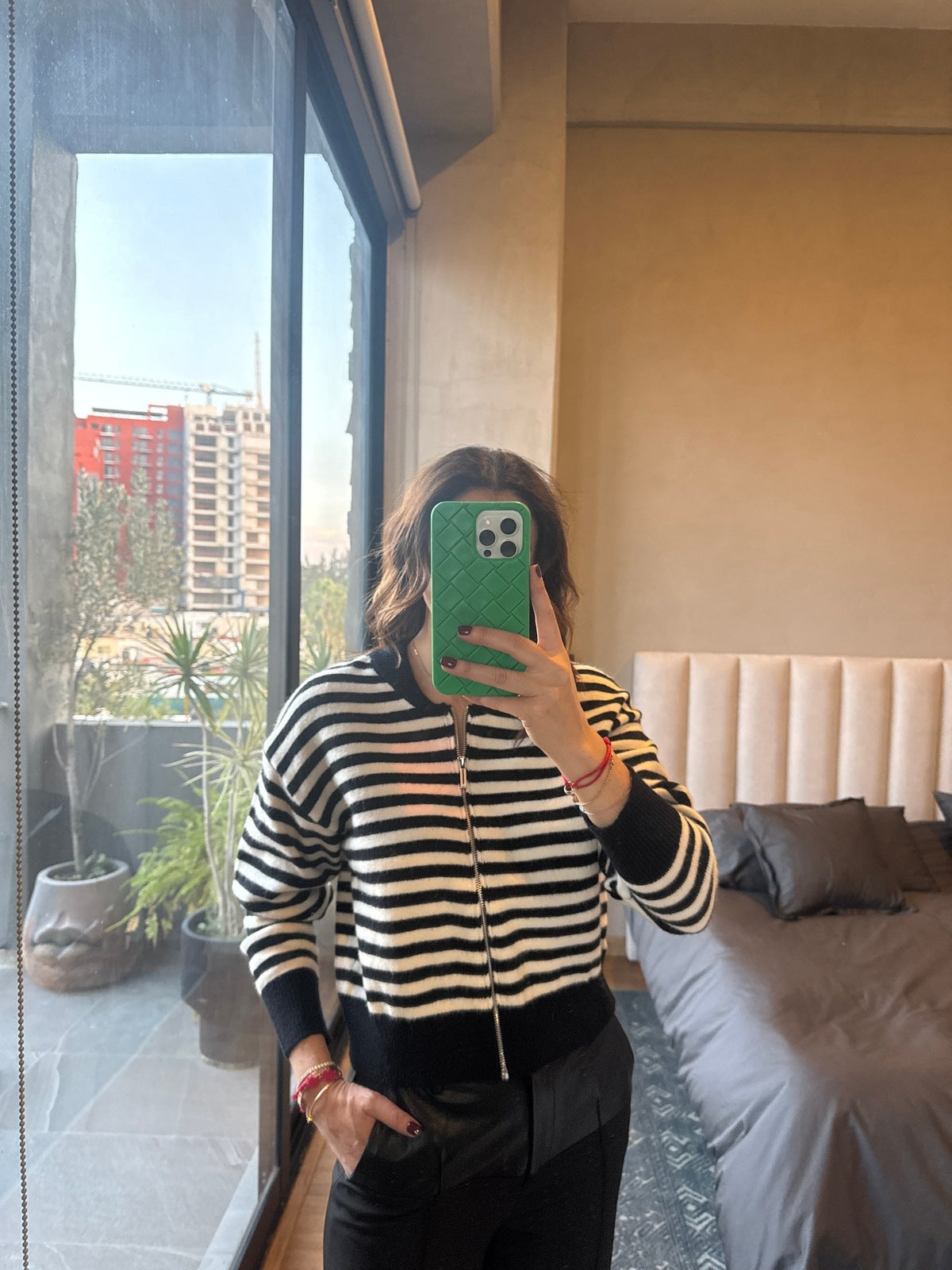 Sweater cierre rayas