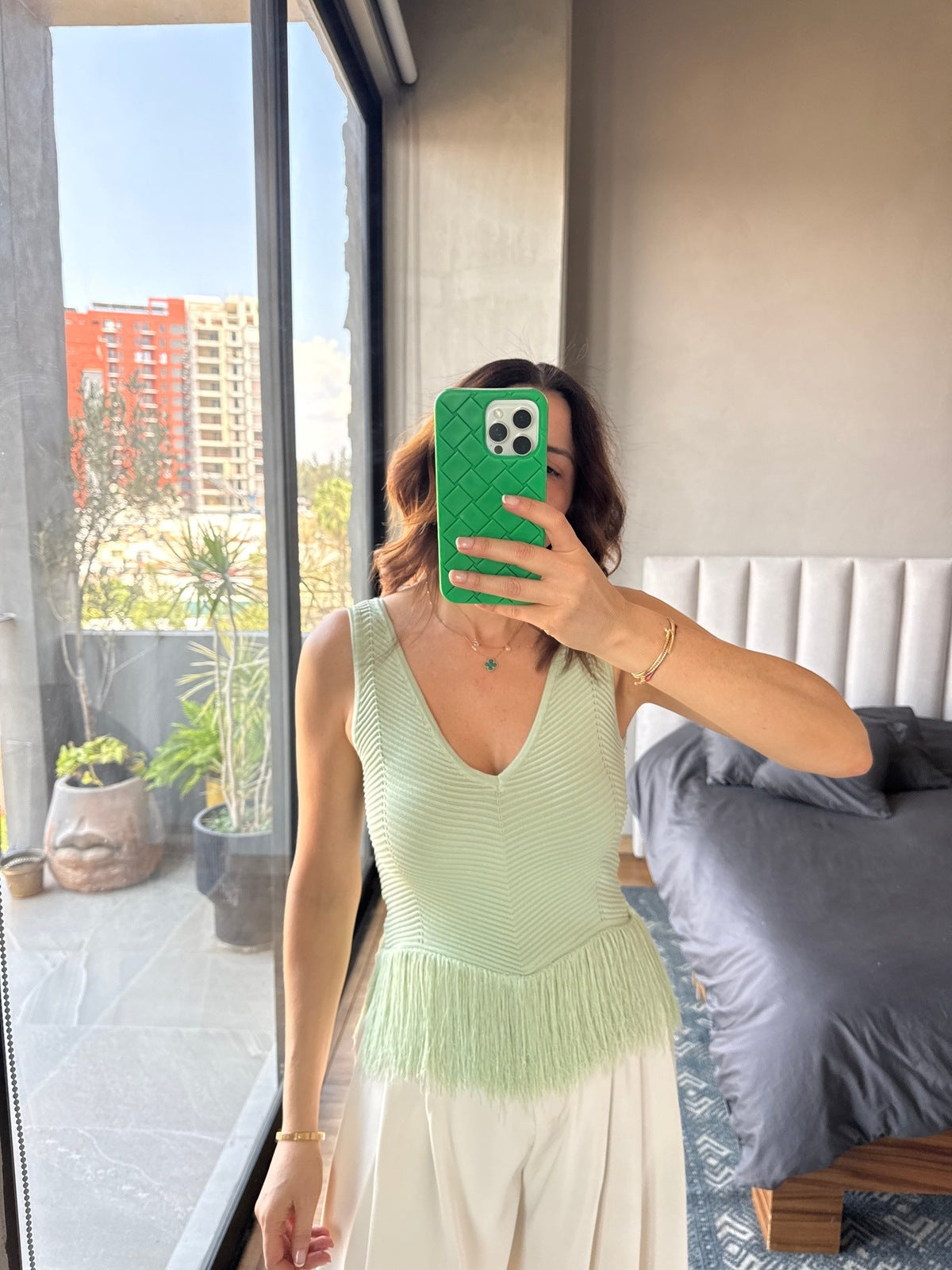 Blusa sin mangas tejida con flecos menta