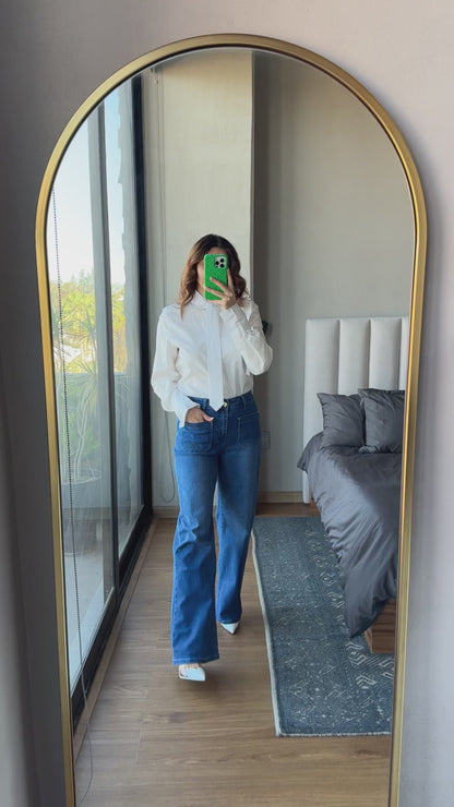 Jeans con detalle bolsas al frente