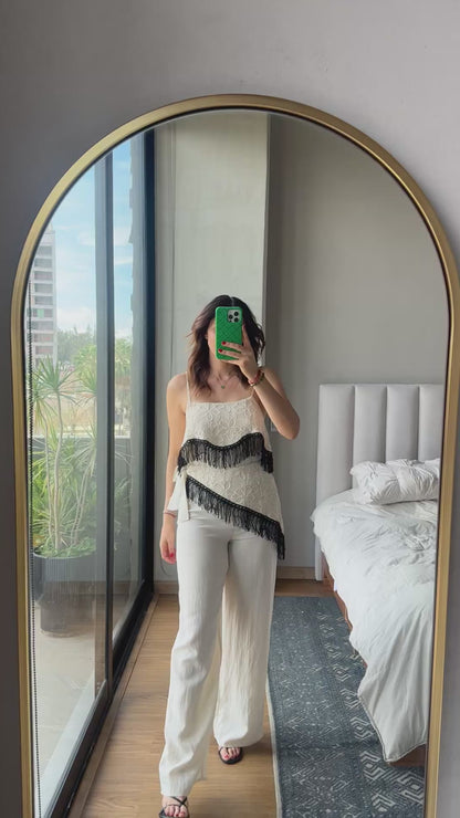 Set blusa y pantalón con detalle fringe en negro