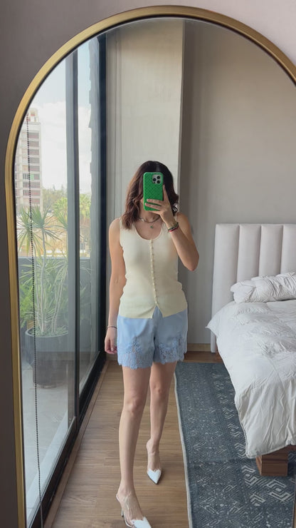 Blusa sin mangas botones baby yellow