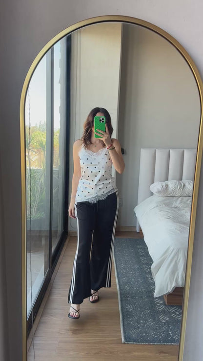 Track pants satín con linea negra